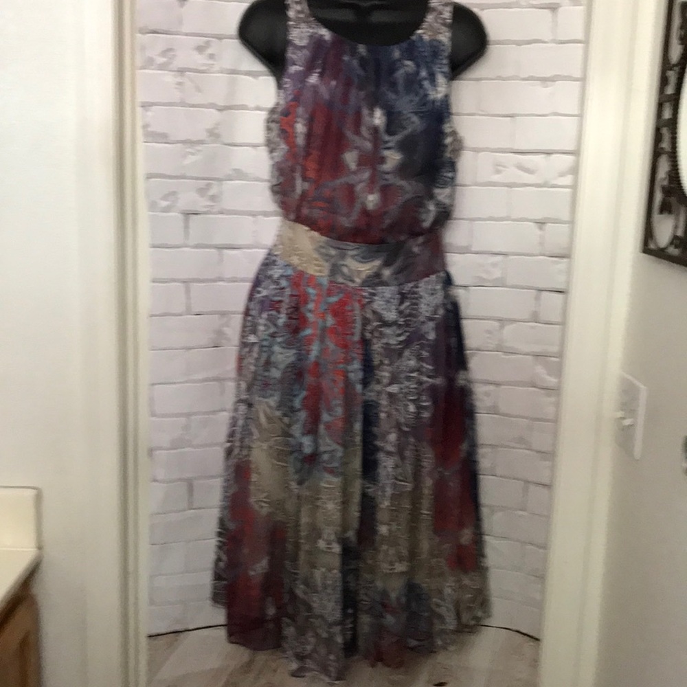 Women’s BGN beautiful silk sleeveless sheer dress.